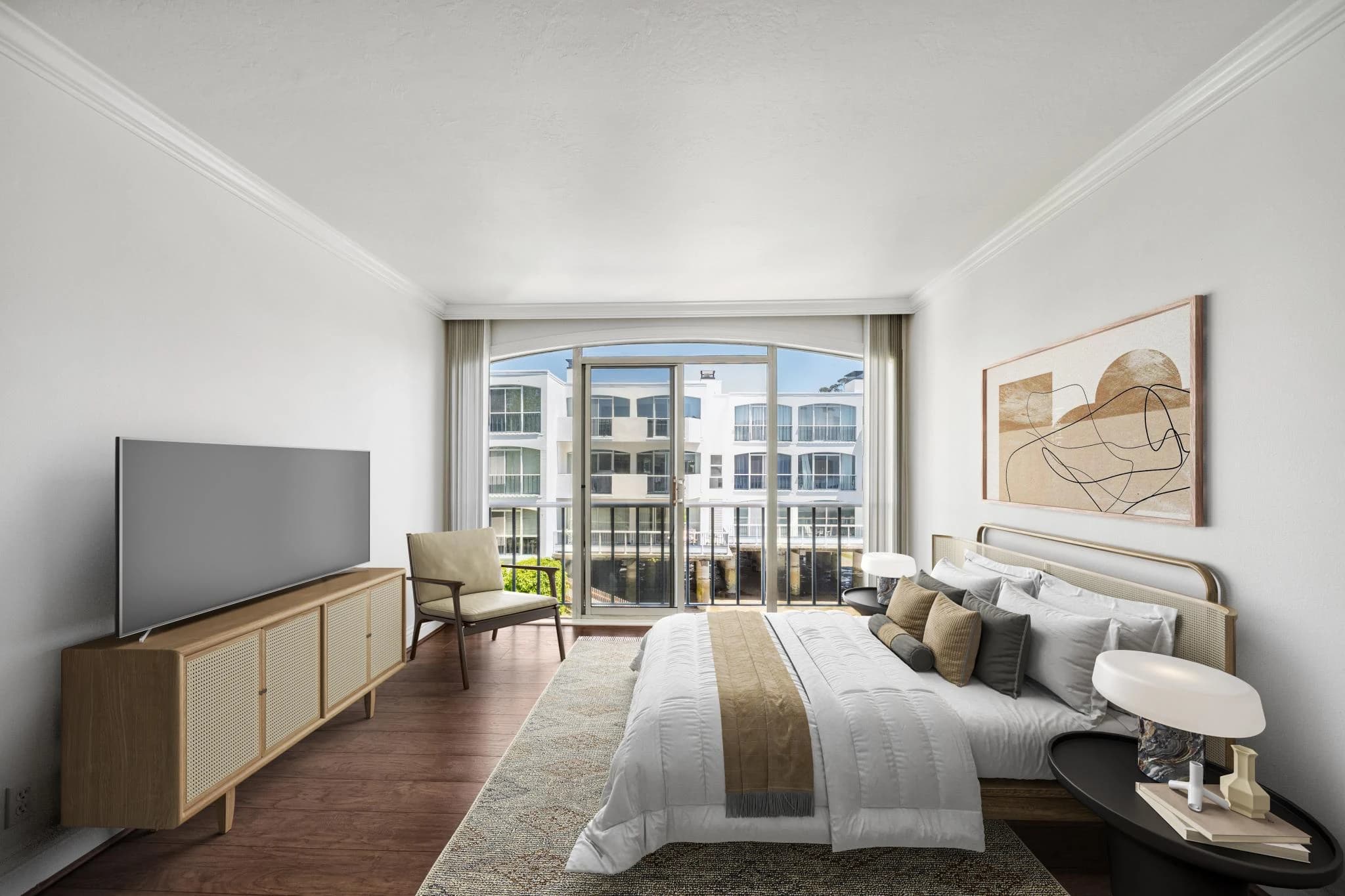 Bedroom at 3226 Shelter Bay Avenue with a wide window overlooking the neighboring waterfront buildings